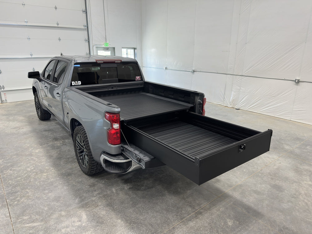 Silver Bullet drawer system fully extended from a gray 2021 Chevrolet Silverado 1500